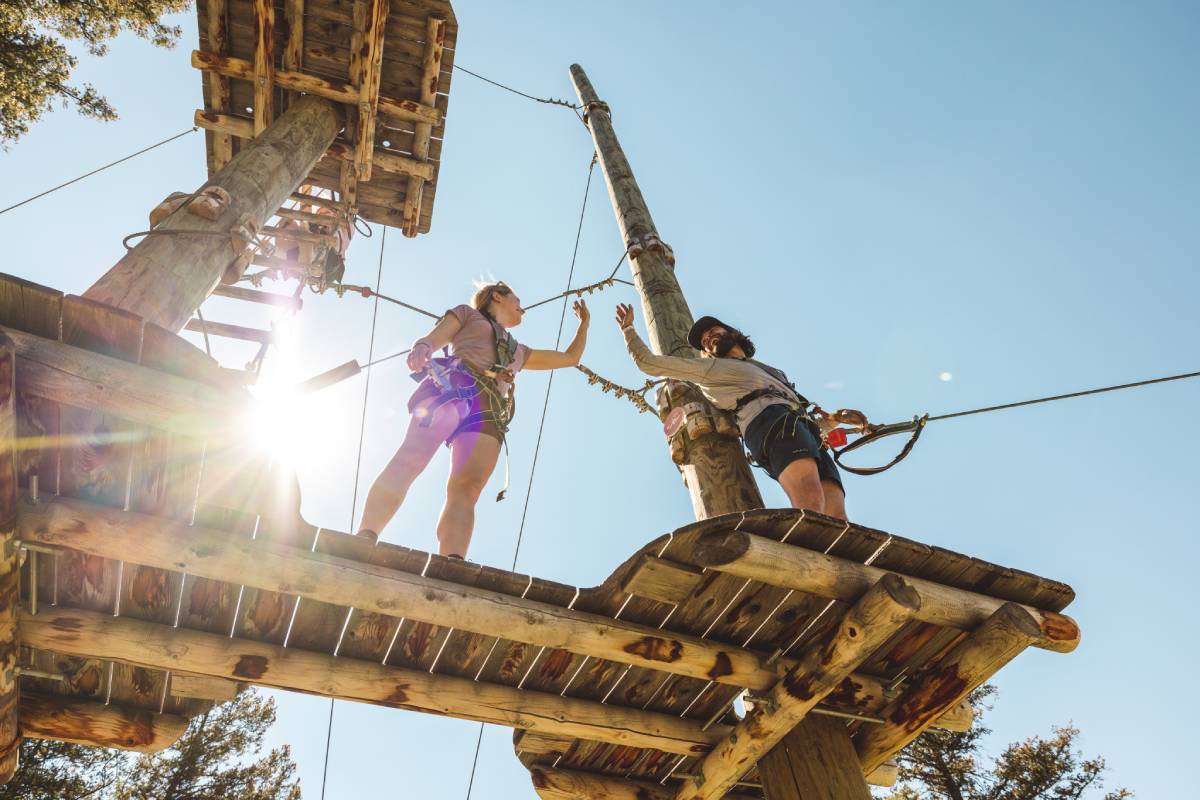 People taking the Snow King’s Treetop Adventure Course in Jackson, Wyoming